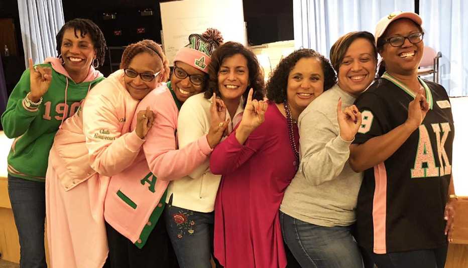 Members of the AKA sorority, smiling for a photo