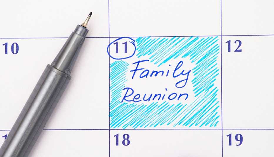 closeup of desk calendar with one date circled saying family reunion