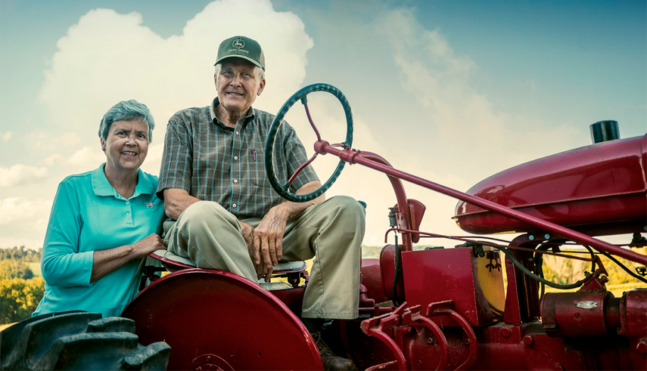 Nancy and David Greene with one of their two restored antique tractors