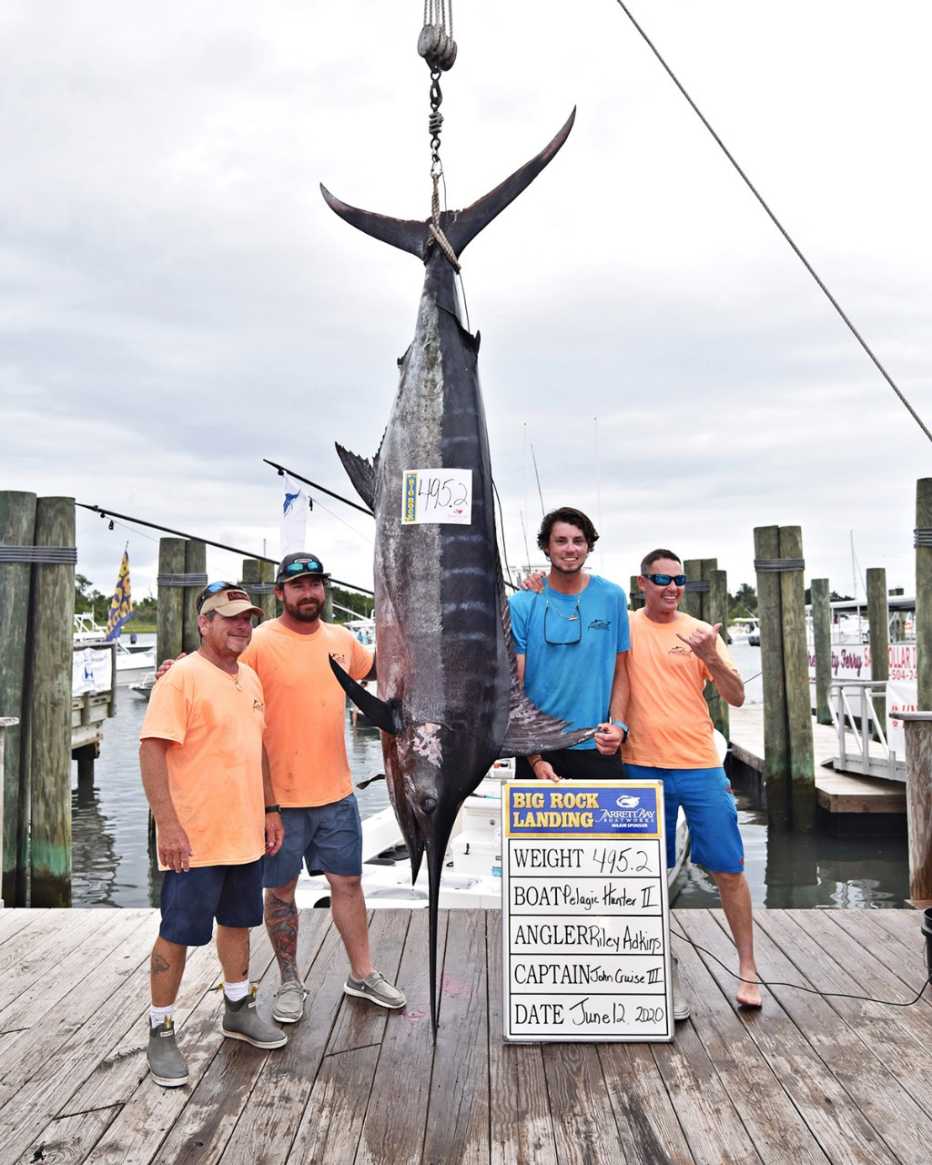 captain john and his crew pose with their catch
