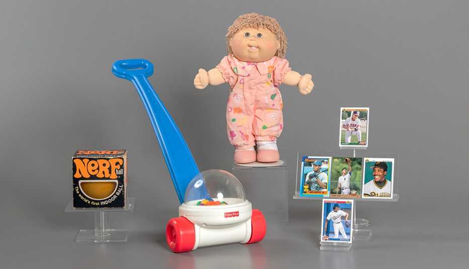 new toys inducted into the national toy hall of fame from left to right nerf balls fisher price corn popper cabbage patch kids and baseball cards