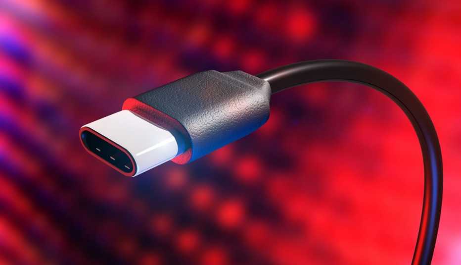 a curled usb-c cable connector on a red and black field