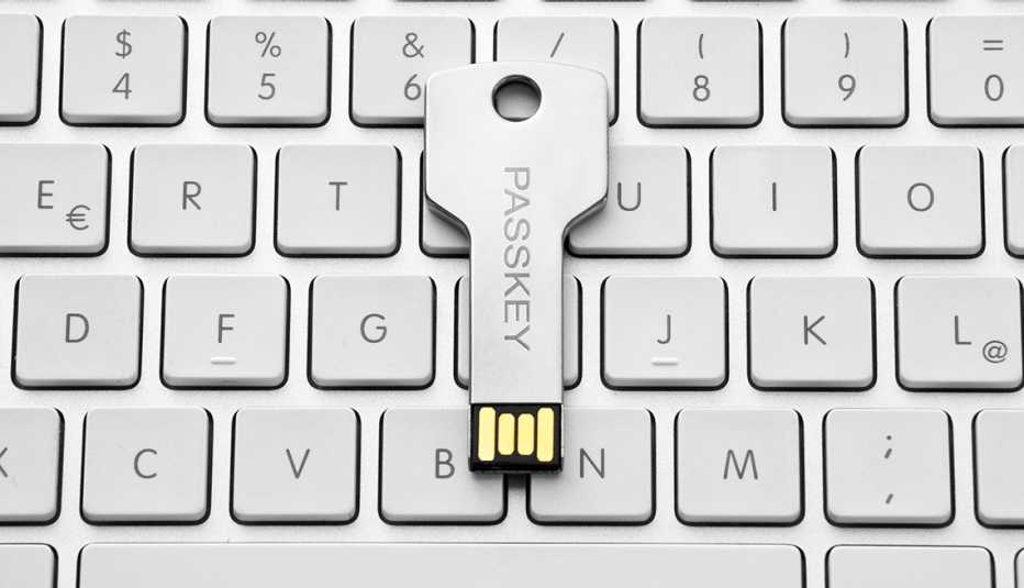 a usb marked passkey on a keyboard
