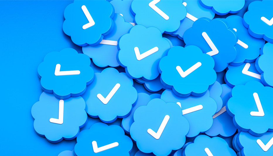 a pile of twitter blue check marks