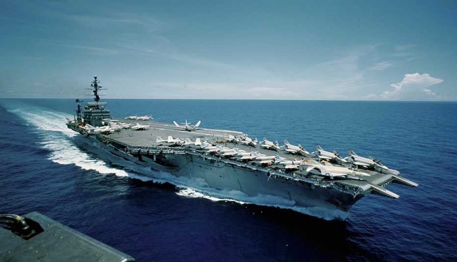 Aerial views of the aircraft carrier USS Constellation at sea. Photograph taken on September 3, 1966