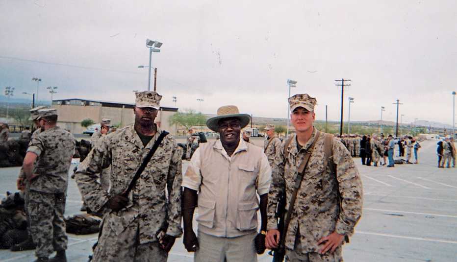 From left: Larry II, Larry Sr. and friend Garrett W. Bush on deployment day in 2011