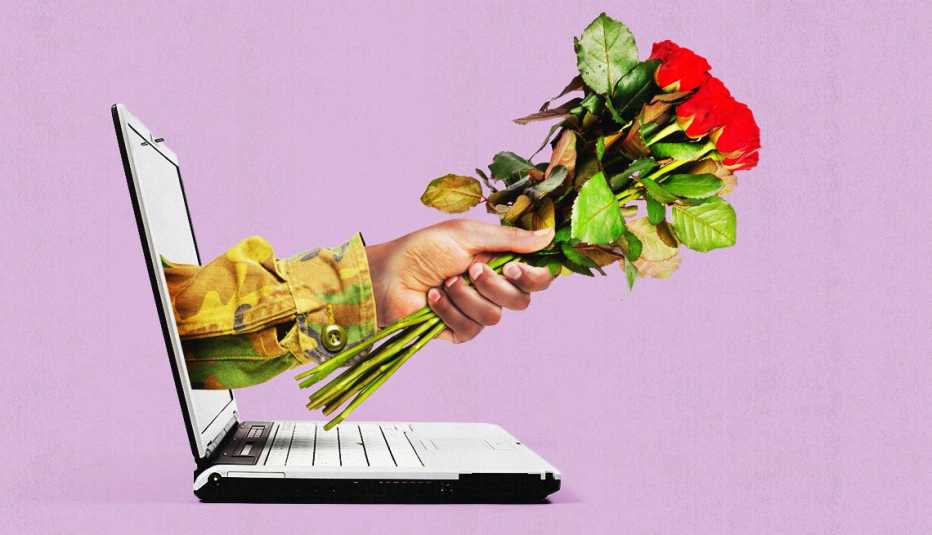 a hand with flowers is coming through a computer screen