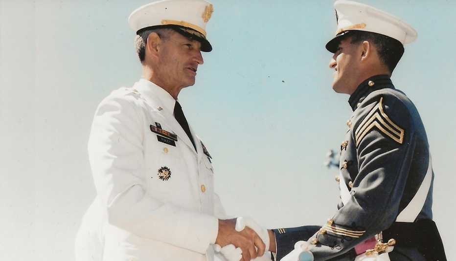 Dave Foley receives his diploma from his dad, Robert Foley, at West Point graduation exercises in 1994. 