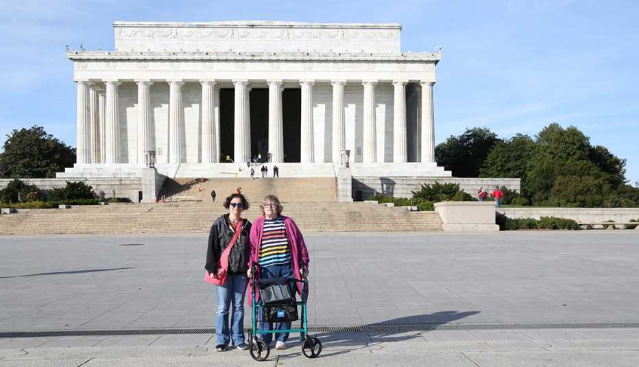 two people stand in front of the lincoln memorial in washington d c