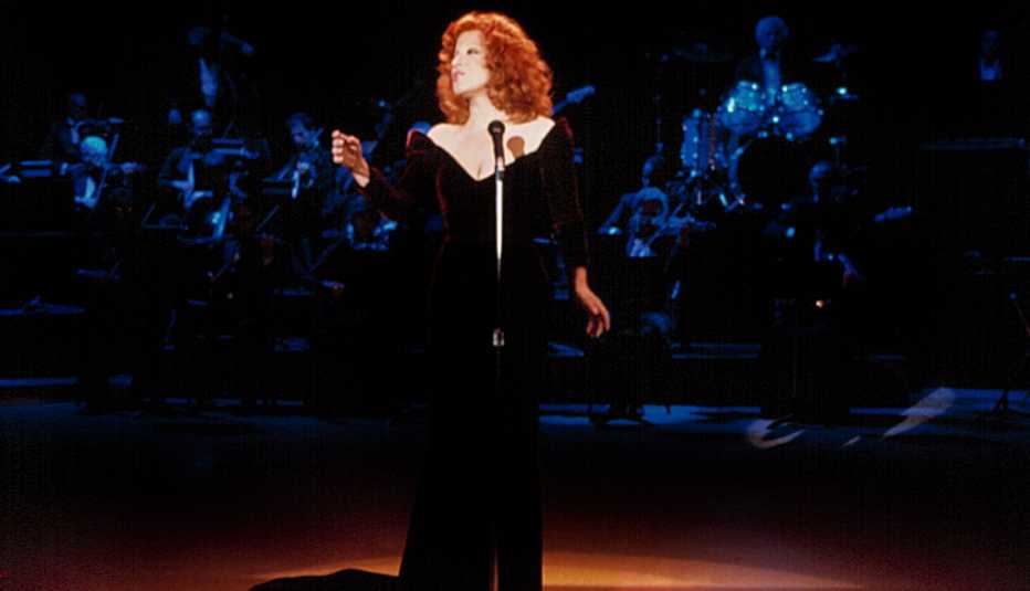 Bette Midler on stage in a still from the movie Beaches