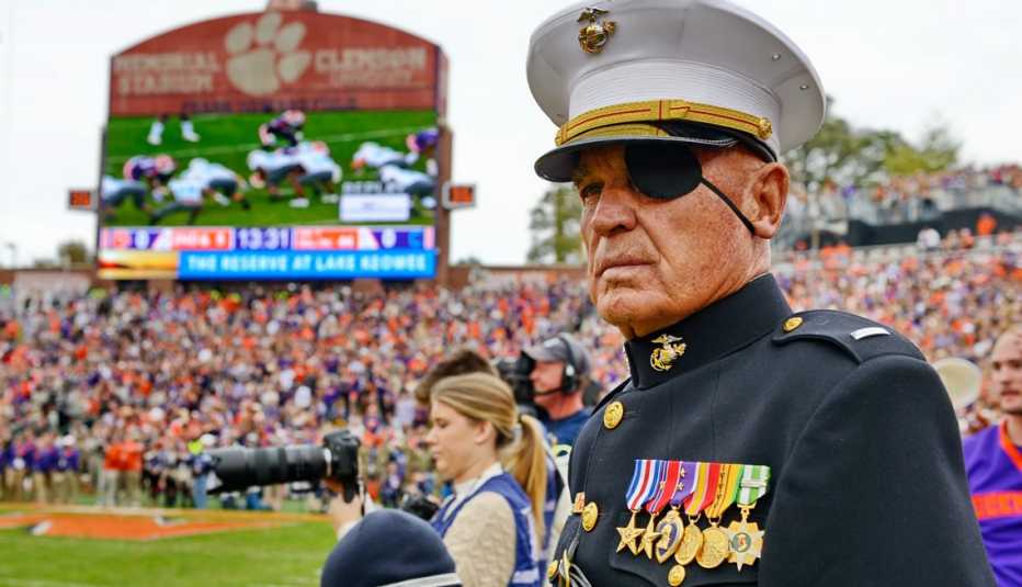 a marine attends a football game