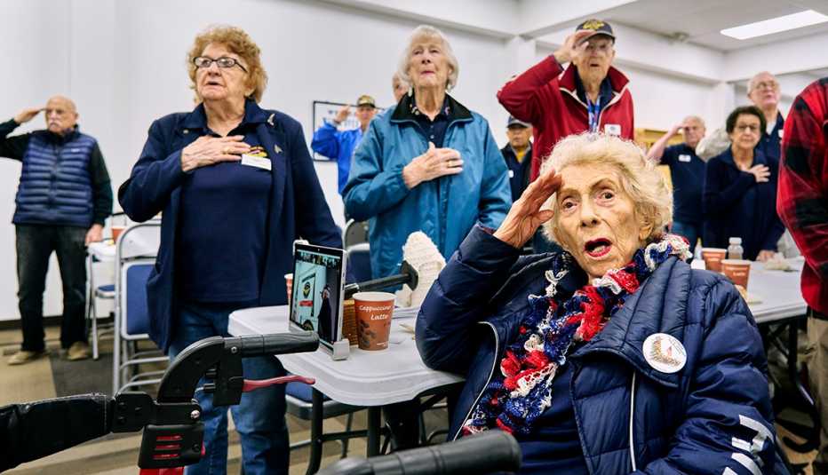 world war ii veteran ethel margolin salutes in the foreground during a wings over wendy's veterans meeting in california