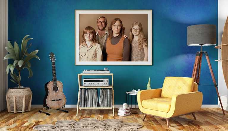 a living room with a cheesy family portrait on the wall