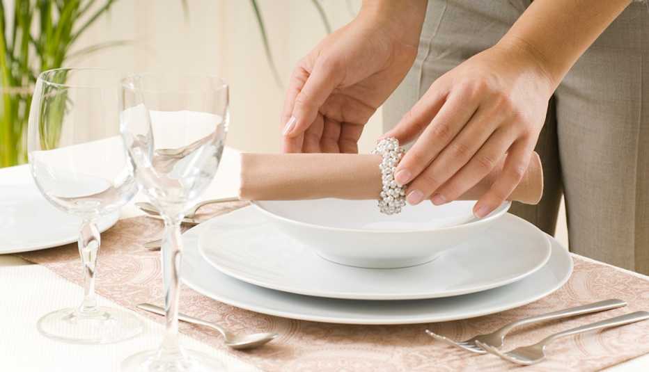 Woman setting a table