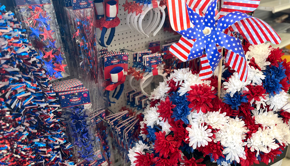 fourth of july decorations such as garlands of tinsel colored fake flowers and garden pinwheels from dollar stores