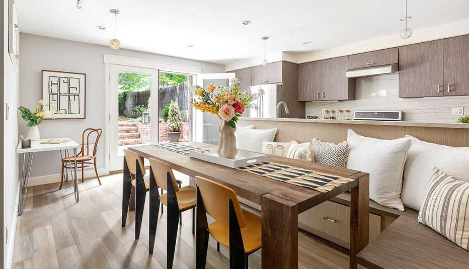 a staged home at four zero eight tenth street showing a kitchen and dining area
