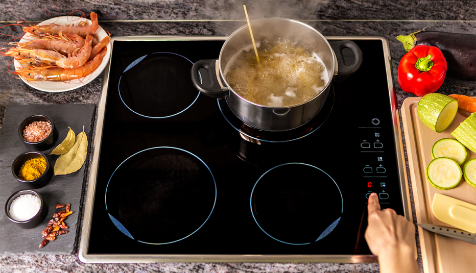 cooking a meal on an induction stove