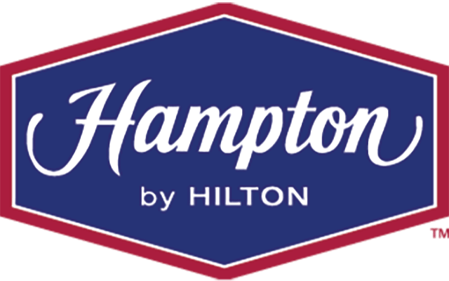 Hampton by Hilton logo with white lettering in a blue, red outlined square/triangle shape