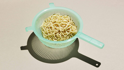 Weather will affect food prices, here is what to stock up on - pasta in strainer