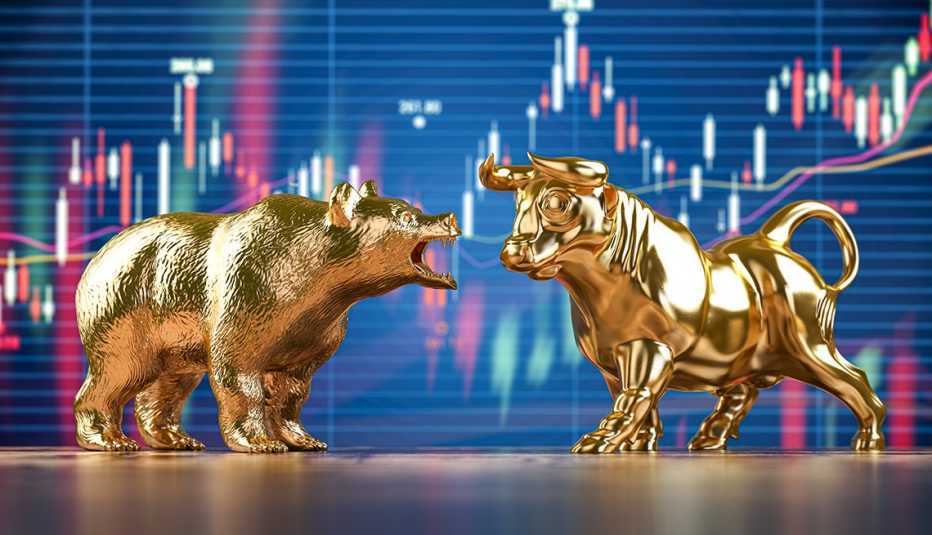 Golden bull and bear on stock data chart background