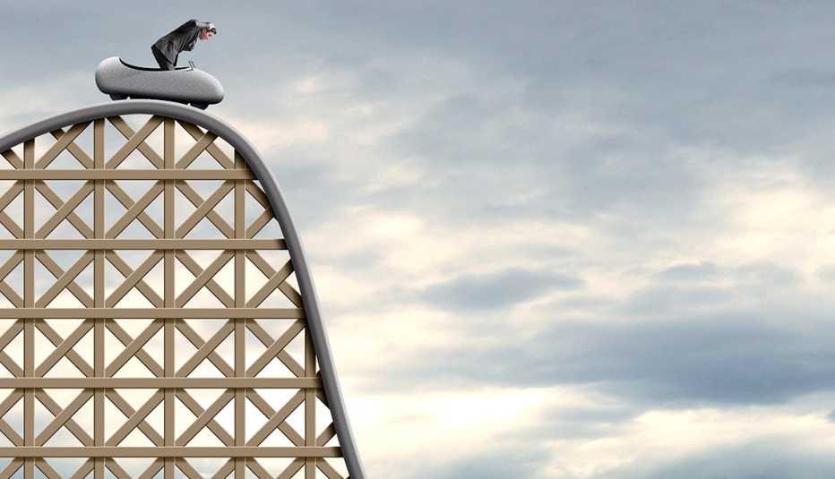 a person going down the hill of a roller coaster