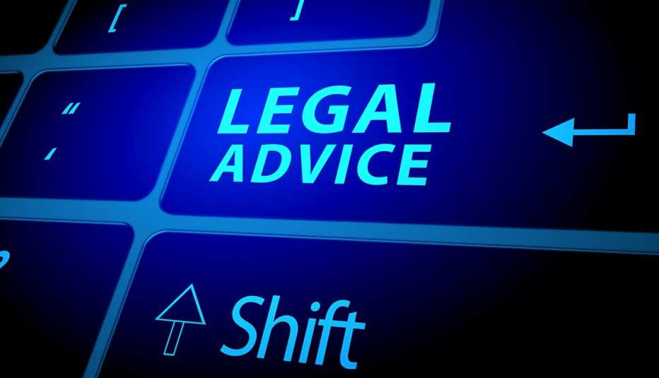 Legal advice button on backlit blue glowing computer keyboard