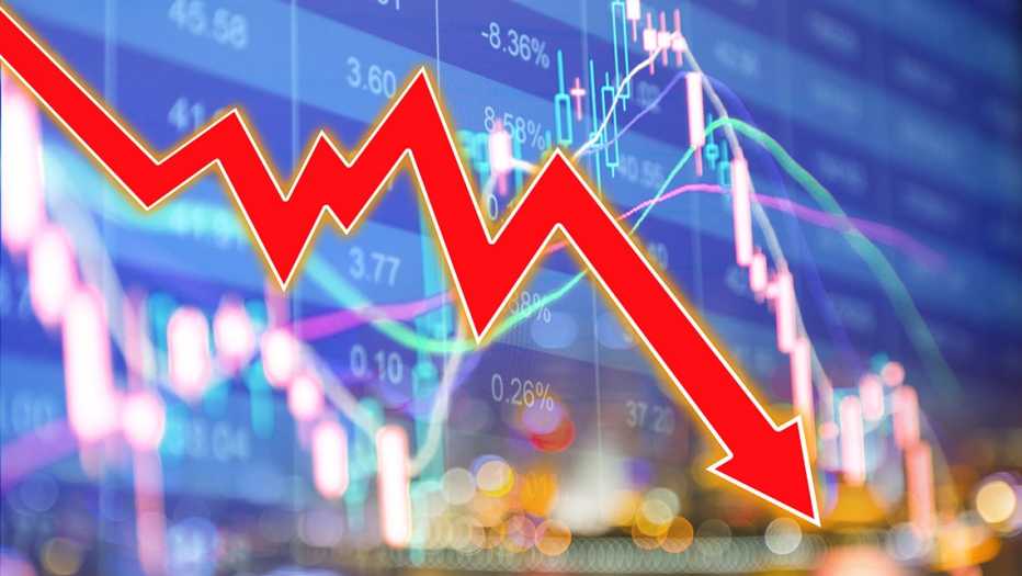 stock market screen display overlaid with a large red downward trending arrow