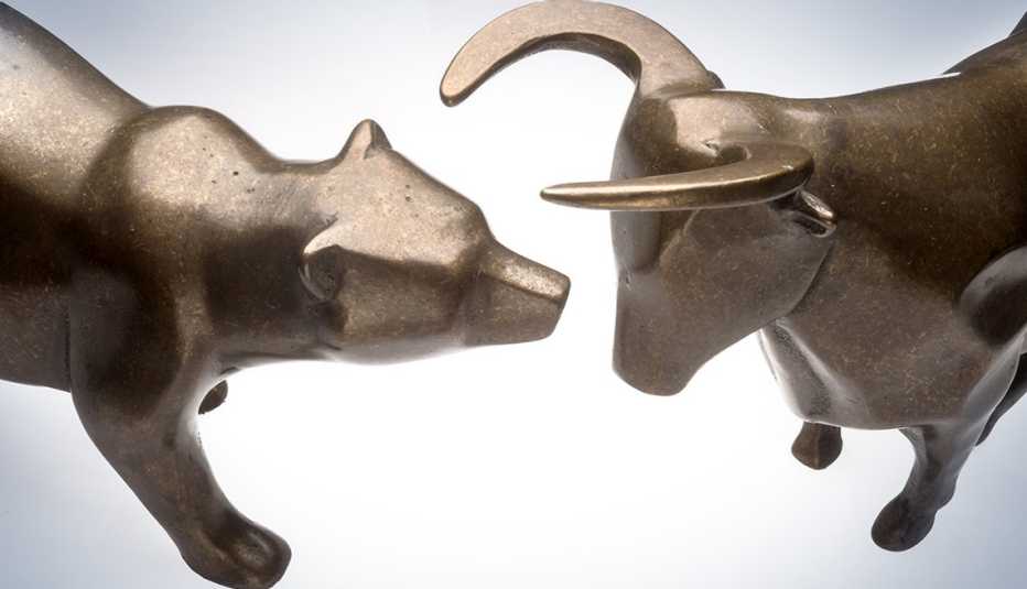brass sculptures of bull and bear