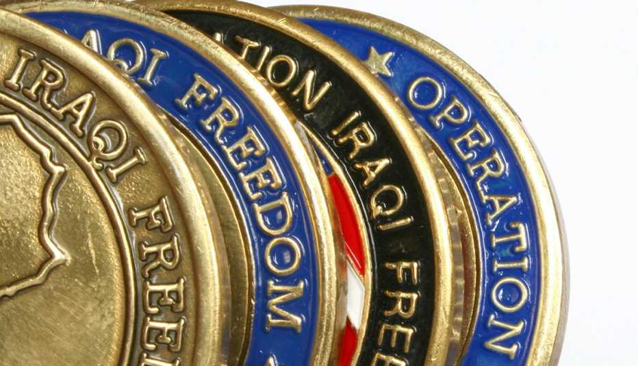 detailed view of a line up of Operation Iraqi Freedom commemorative medallions