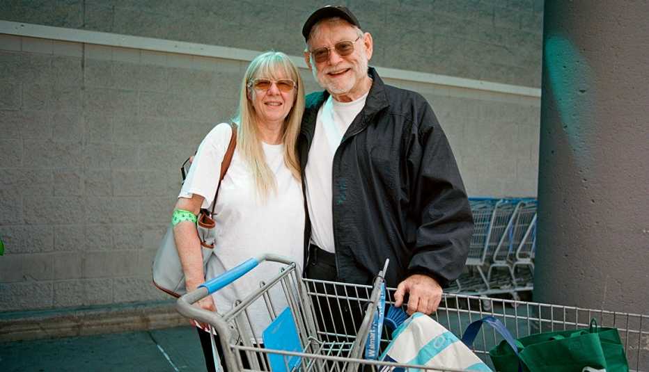 Sherri Evans and Robert Evans outside of Walmart after shopping at the Westbury, New York store. Photographed on May 22nd 2023.