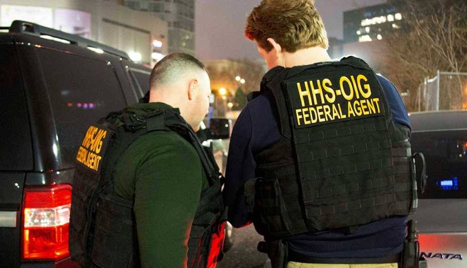 Federal agents in a takedown of suspects for a medicare fraud scheme
