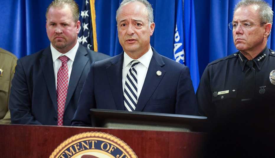 United States Attorney Nick Hanna, center, announces the arrest of Mark Steven Domingo during a press conference at the U.S. Attorney's office in Los Angeles on Monday, April 29, 2019. On Friday, FBI agents arrested Domingo, 26, of Reseda on federal charg