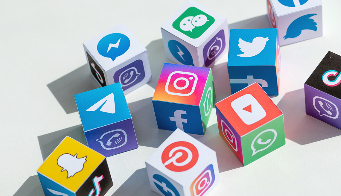 Social media icon logos on paper cubes