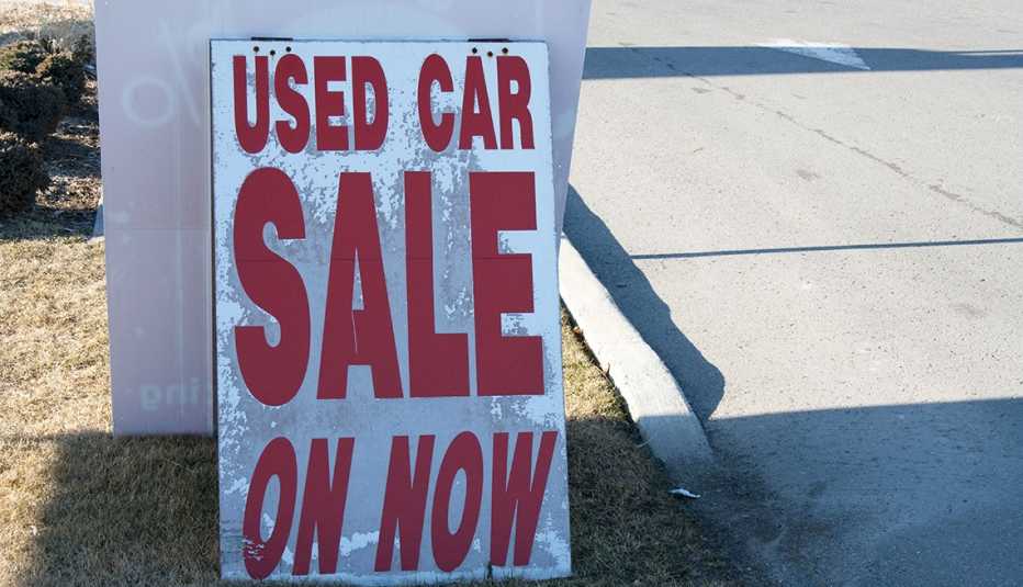  Used car on sale now sign dealership dealer enter road market pavement road