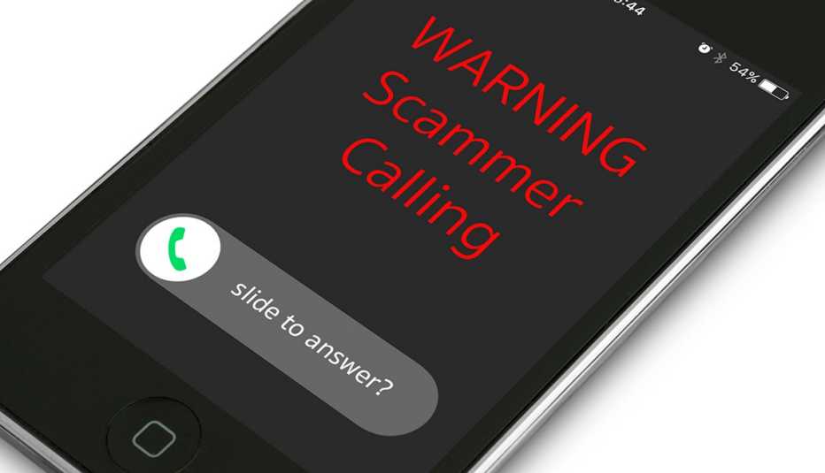 Phone with Warning Scammer Calling on the call screen