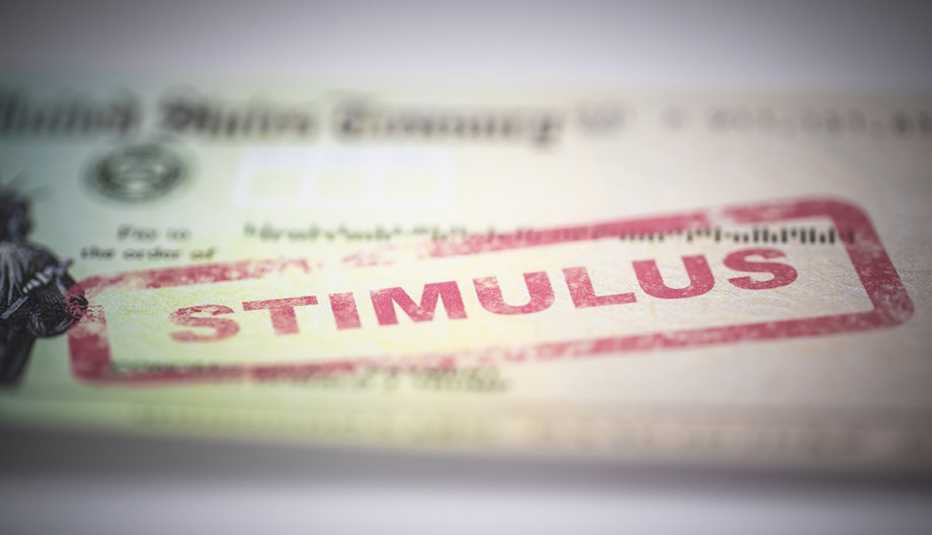 The 2020 economic stimulus check with the word "stimulus" stamped in red ink.