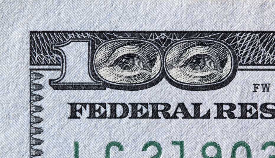 Benjamin Franklin eyes in the 100 dollar bill number