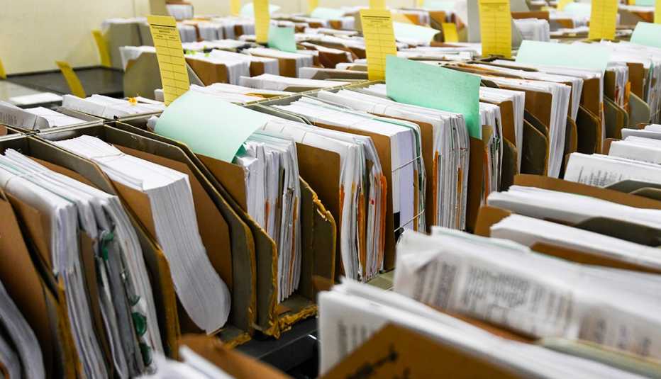 Rows of tax documents in folders sit in the staging warehouse at the Internal Revenue Service's facility on March 31, 2022 in Ogden, Utah. 
