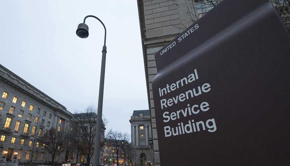 early evening photo of exterior of the Internal Revenue Service building sign in Washington D.C.