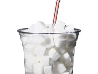 sugar cubes in cup with straw, tax sugar.