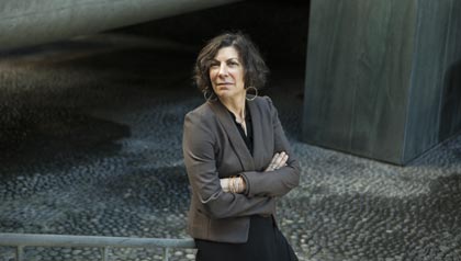 TURN Communications Director Annie Spatt stands for a portrait in San Francisco's financial district - California advocate for lower utility rates