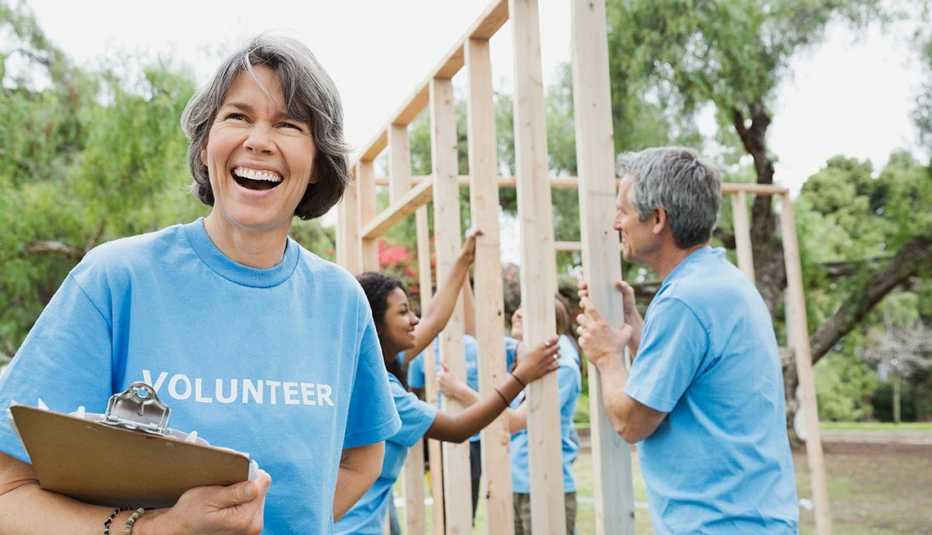Volunteers building a house, Outdoors, AARP, Senior Day