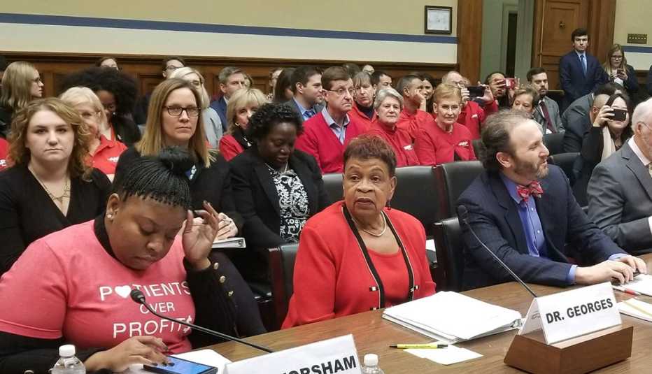 A A R P National Volunteer President Catherine Alicia Georges talks at a hearing