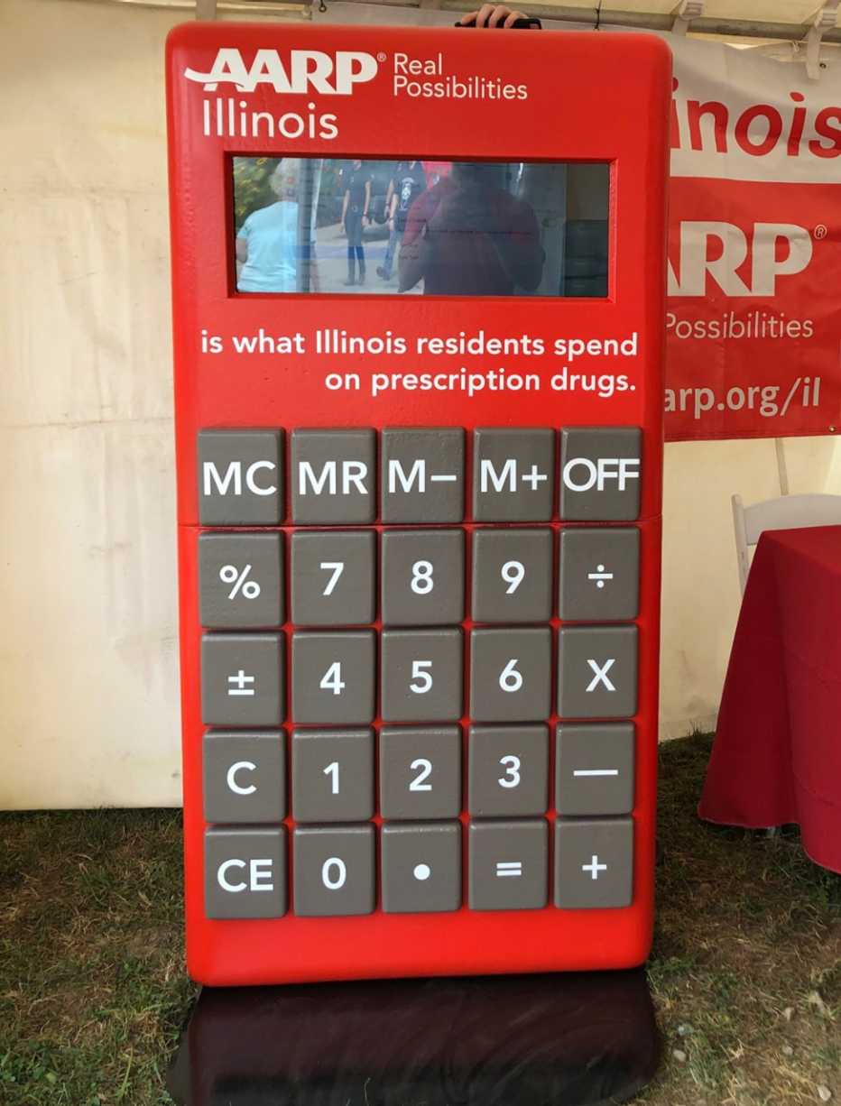 Red calculator showing the cost of prescription drugs in Illinois