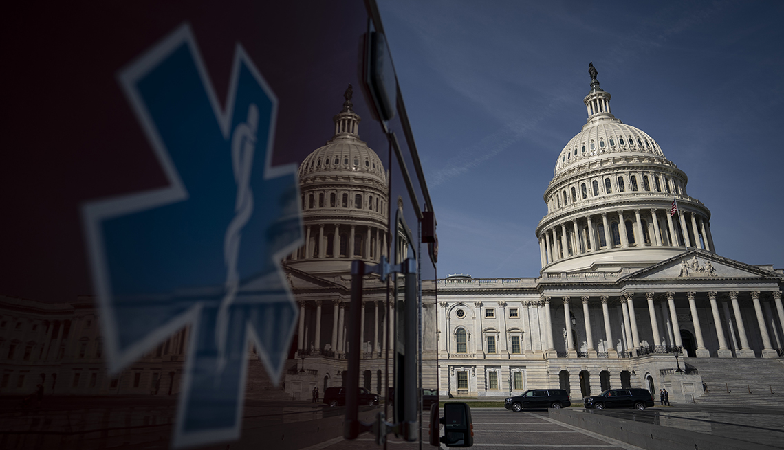 An ambulance sits in front of the U.S. Capitol.