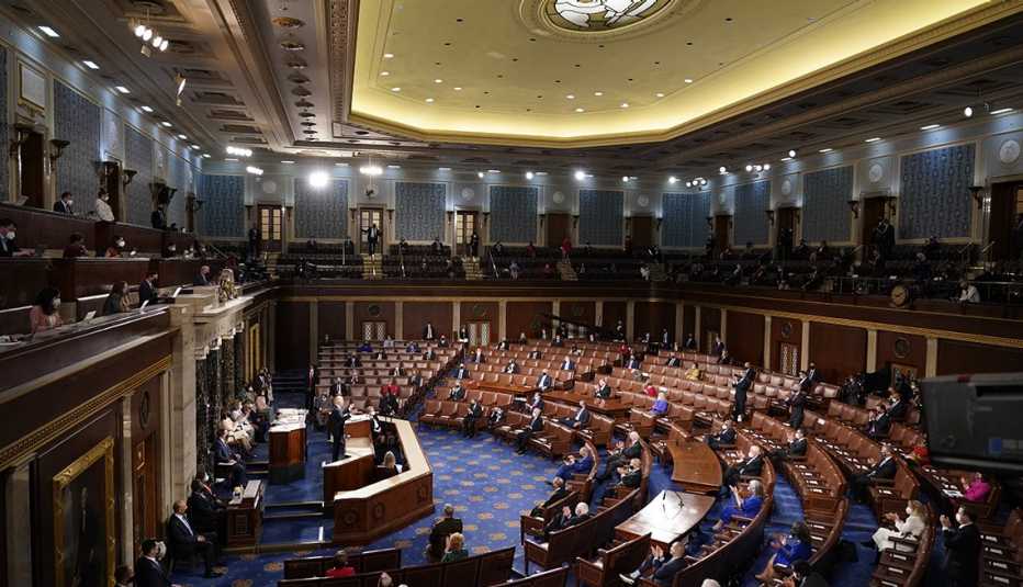 wide angle of President Joe Biden speaking to  sparse, socially distanced attendees at a joint session of Congress Wednesday, April 28, 2021, in the House Chamber at the U.S. Capitol in Washington