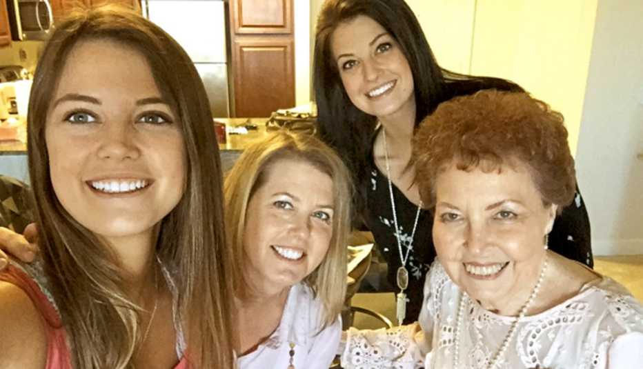 Juanita Purdy, right, with her daughter and granddaughters at her apartment, a few months before she was allegedly robbed and killed there in July 2016