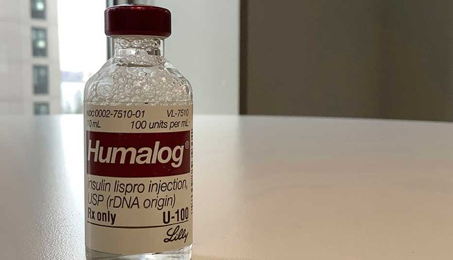 a vial of humalog sits on a table