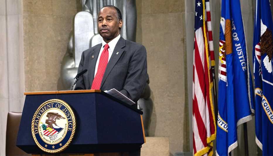 Benjamin S. Carson Sr. delivers a speech from behind a podium