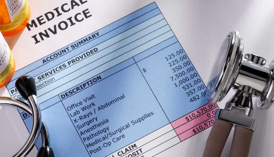 A medical bill with a stethoscope and pill bottles
